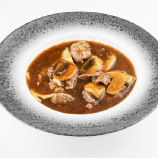 Ternera con bambú y setas