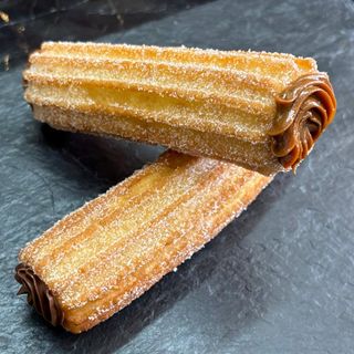 Xuixo relleno con dulce de leche. (Ud)