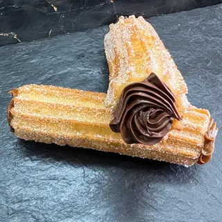 Xuixo relleno de avellanas tipo Nutella (ud).