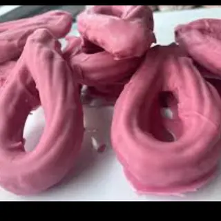 7 Churros de chocolate rosa.