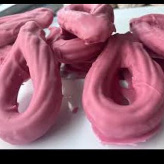 7 Churros de chocolate rosa.
