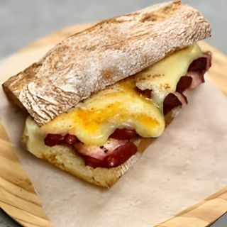 Polbo grellado con tetilla