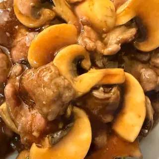 Ternera con champiñones
