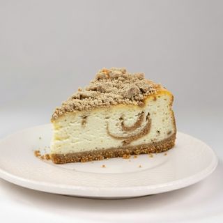 Queso horneado con mantecado de canela, P