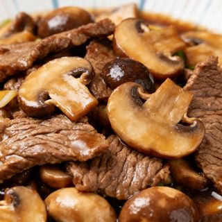 ternera con champiñones
