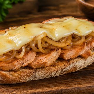 Montadito: Lomo Adobado Con Cebolla Y Queso