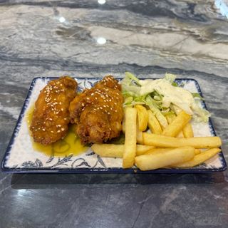 Alitas en salsa de maracuyá