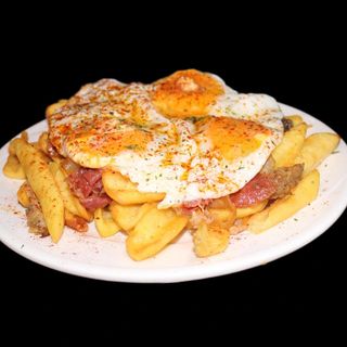 Huevos rotos con jamón. 