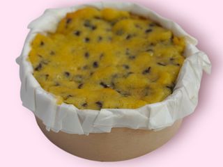 Cheesecake crumbl cookie porción