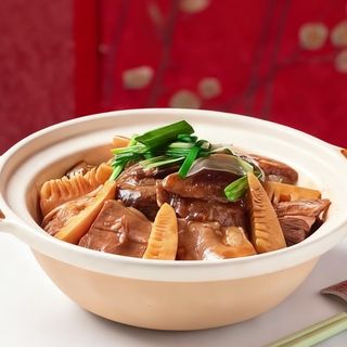 Ternera con bambú y setas