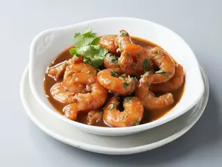 Gambas con salsa ostras