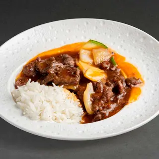 TERNERA SALSA OSTRA CON ARROZ BLANCO