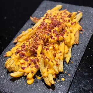 Patatas Con Cheddar Y Bacon