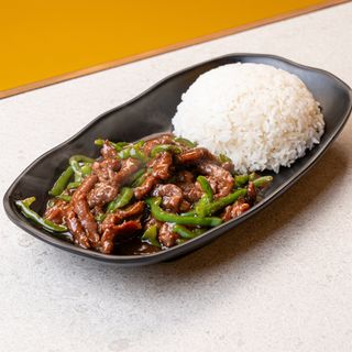 Ternera ostra con arroz blanco