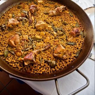 Paella de secreto y setas