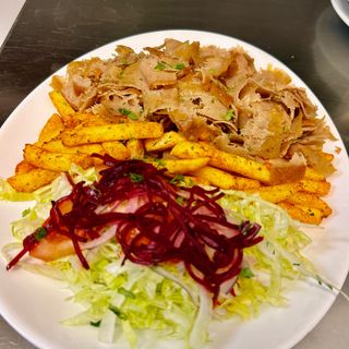 Plato con patatas o arroz