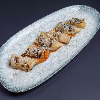 Puerros confitados a la brasa