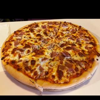 Pizza jamón y queso