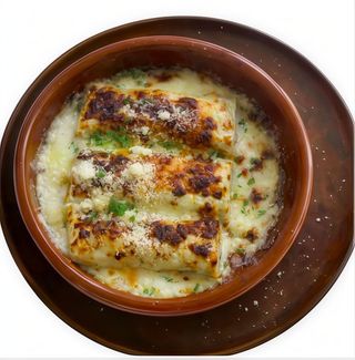 Canelones De Carne Rustidos Con Bechamel Tartufa