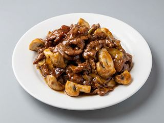 Ternera Con Champiñones