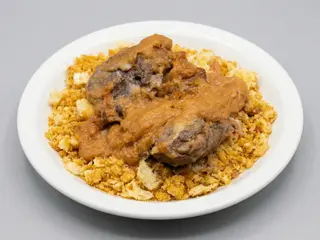 Migas Con Carrillera