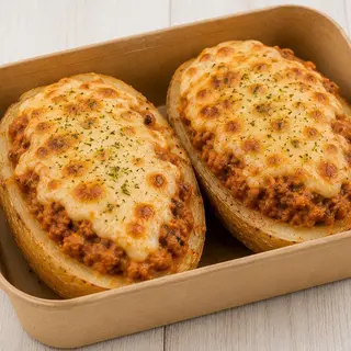 Patatas rellenas de bolognesa