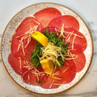 Carpaccio Di Manzo Con Rucola E Grana