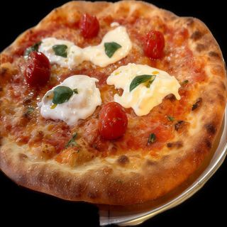 Pizza de tomate confitado y burrata