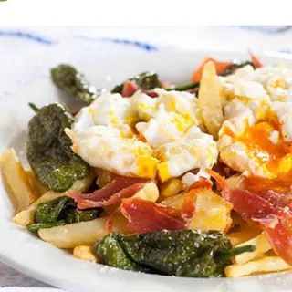 Huevos rotos con jamón