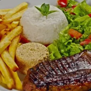Bistec de ternera, arroz , patata , ensalada