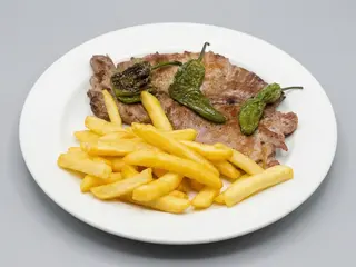 Secreto De Cerdo a la leña
