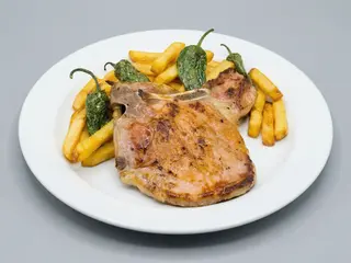 Chuleta de cerdo a la leña