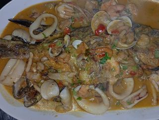 dorada en salsa de marisco