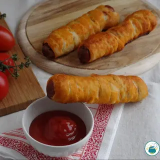 Rollito  con Salchicha