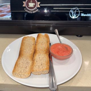 Pan Integral Con Aceite Y Tomate