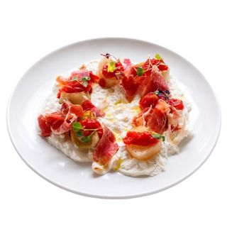 Burrata con puerros confitados