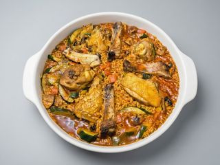 Arroz meloso con Gallo de corral y costilla