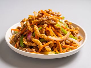 tira de ternera rebosada con salsa