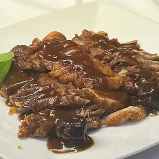 Pato Con Salsa Ciruela