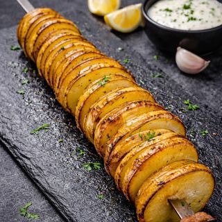 Brocheta De Patata Con Panceta