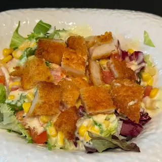 Ensalada Deluxe César con Pollo