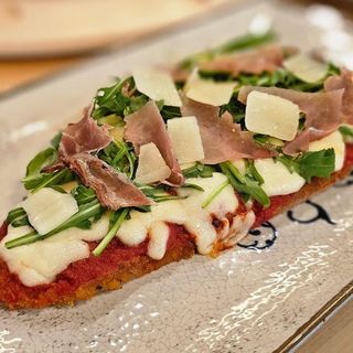Escalop-Pizza prosiutto