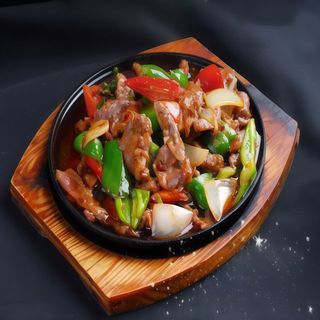 55.  Ternera a la plancha con salsa de pimienta