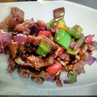 Picaña salteada con salsa pimienta negra