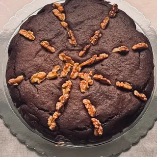 Bizcocho De Plátano Con Chocolate Y Cacahuate (Porción)