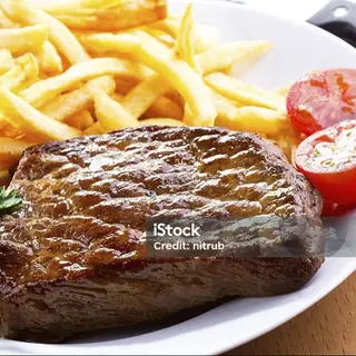 Bistec patatas y huevo