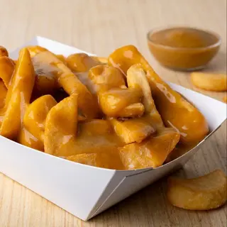 Patatas Fritas Con Salsa Curry