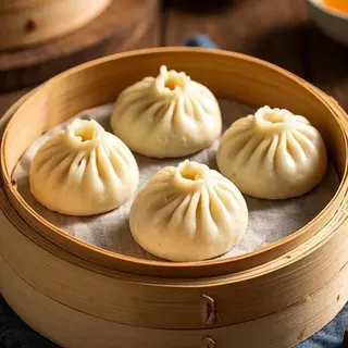 Xiaolongbao (Bollos al Vapor)