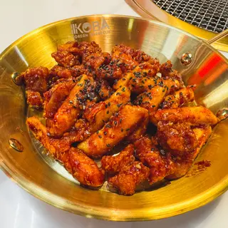 Topoki con pollo frito