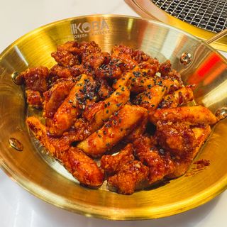 Topoki con pollo frito